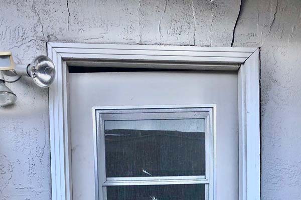 Sticking Door 2 Are Cracks In A Brick House Always a Foundation Issue?